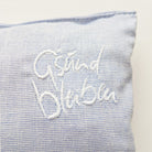 Kleines Zirbenkissen "G'sund bleiben" Hellblau