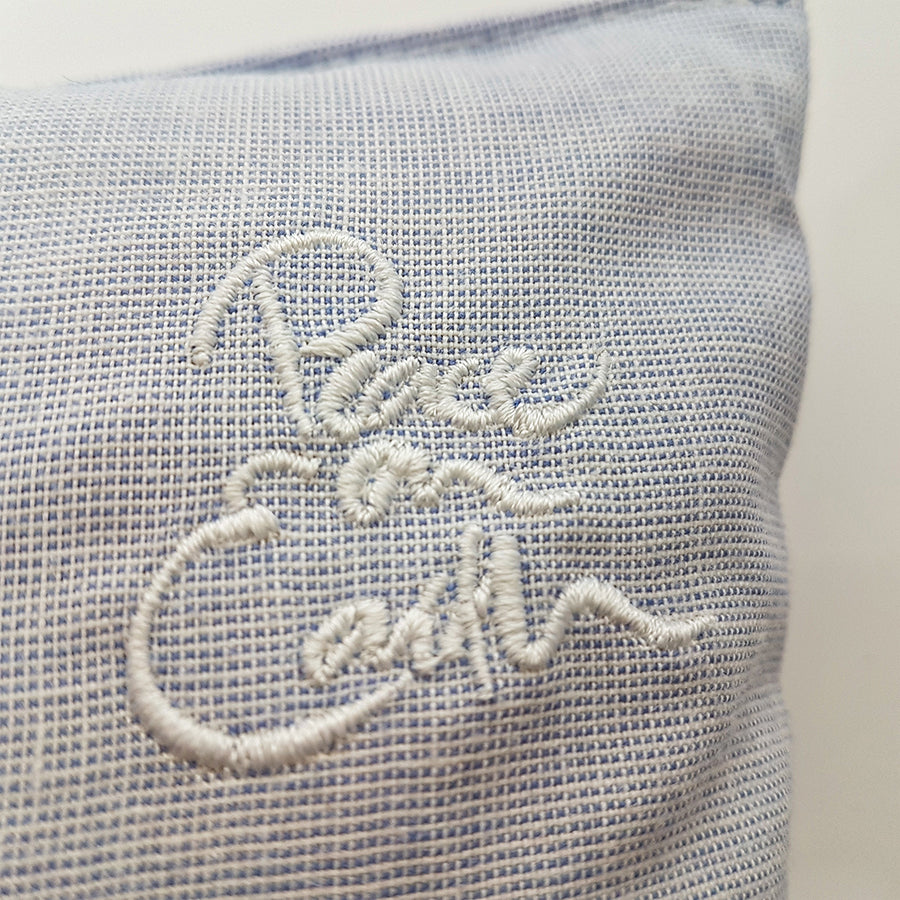 Kleines Zirbenkissen "Peace on Earth" Hellblau