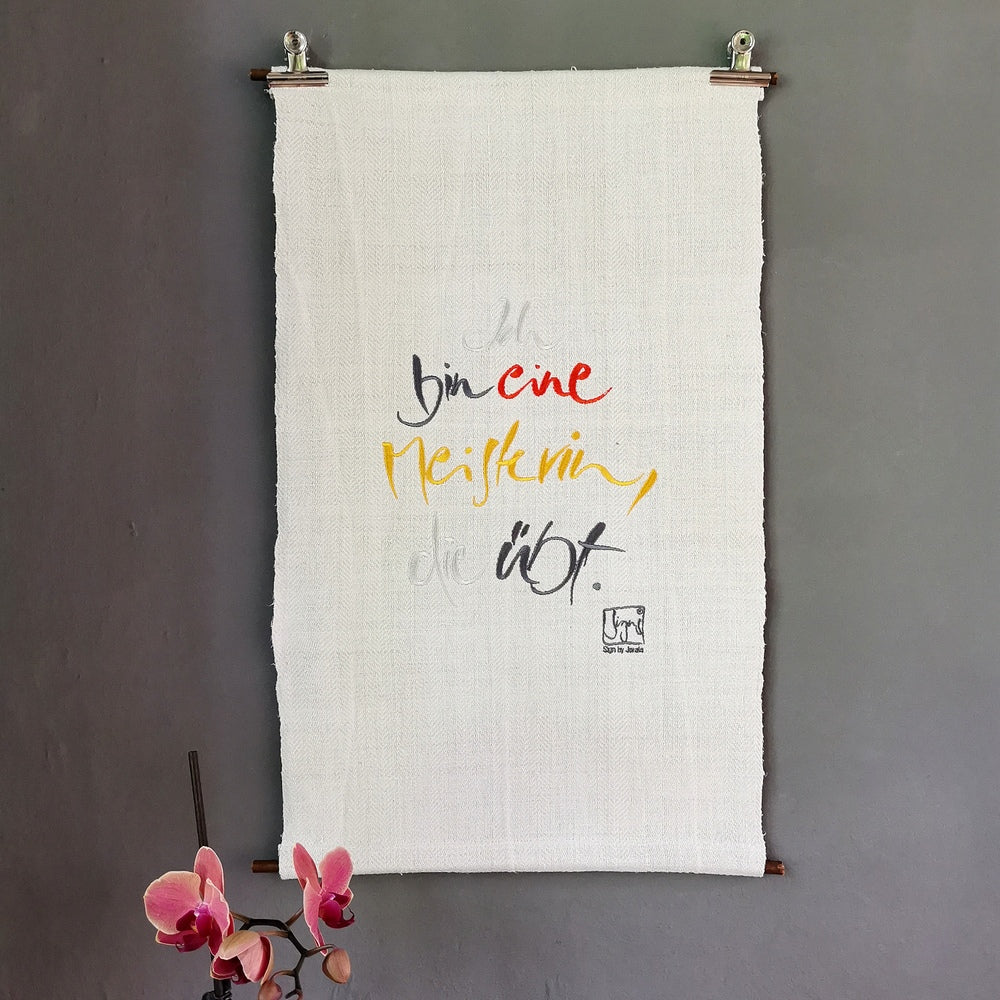 Haussegen "Ich bin eine Meisterin, die übt."