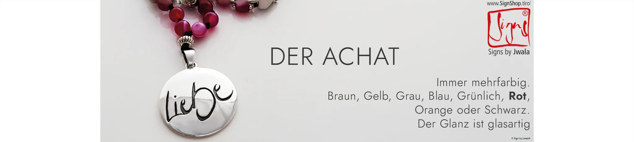 Nahaufnahme eines Achatsteins mit seinen natürlichen, sanft geschwungenen Farbschichten und einzigartigen Maserungen.